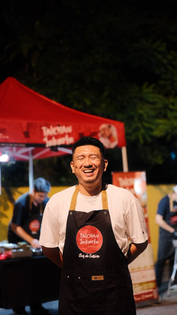 Taichan Jakarta chef de cuisine smiling at the stall