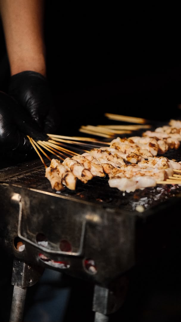 Sate taichan skewers grilling close up